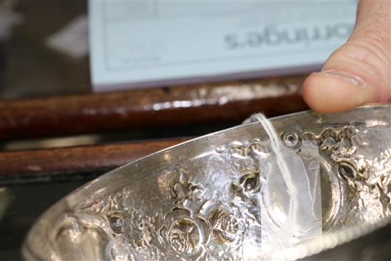 A 19th century Indian Colonial embossed silver sugar bowl by Cooke & Kelvey, Calcutta, 6.5 oz.